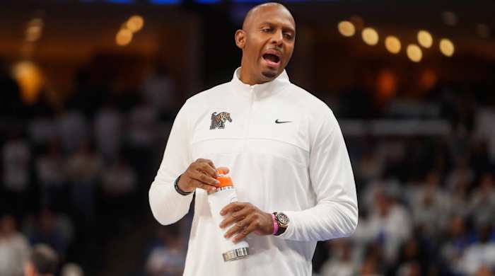 Memphis head coach Penny Hardaway reacts while coaching in a game.